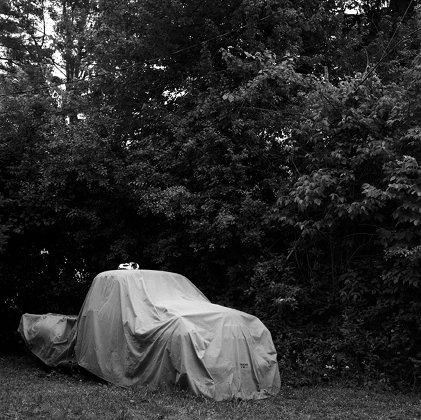 Dana Gentile: Tucked Away, 2009, silver gelatin print, 25 x 25cm | Six Memos presents Trompe Le Monde at Occupy Space | Friday 4 February – Friday 4 March 2011 | Occupy Space