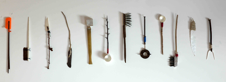 Stuart Cairns: Side by Side; Small Paddle Plastic, Long Shiv, Small Knife, Small Paddle Wood, Signal Ladle, Small Rake, Signal Washer Tool, Small Spoon, Signal Brush, Small Shiv, Small Fork | PORTFOLIO: Metals & Stone | Friday 30 October – Sunday 22 November 2015 | Solomon Fine Art