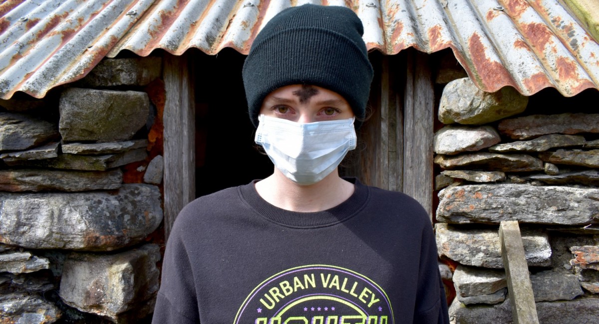 Teenage girl wearing a face cover, undisclosed location, County Cork, 2020; from Marie Brett: Day of the Straws | Marie Brett: Day of the Straws | Sunday 21 June – Saturday 19 December 2020 | SIRIUS