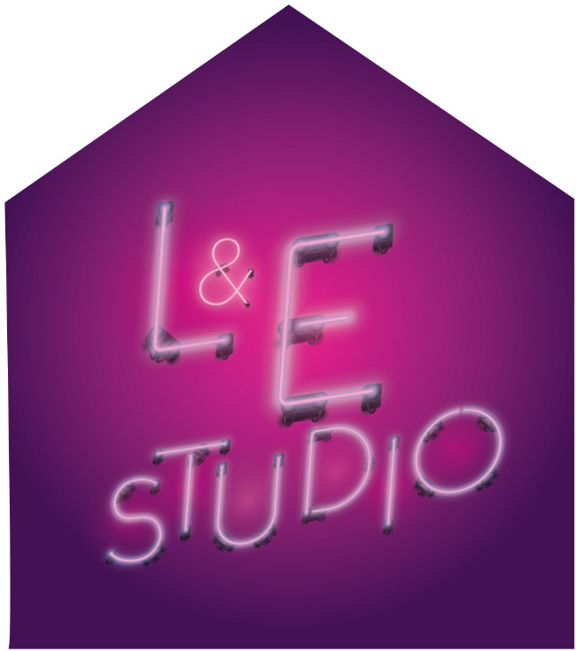 L&E STUDIO | Saturday 26 August 2023 – Sunday 7 January 2024 | Crawford Art Gallery | Image: this appears to be a photo, of “L&E STUDIO” spelt out in which neon tubes, as though on the gable of a house or other building with a sloping roof; the ‘&‘ is in thinner neon, and it is a warmer, slightly yellower colour than the other neon 