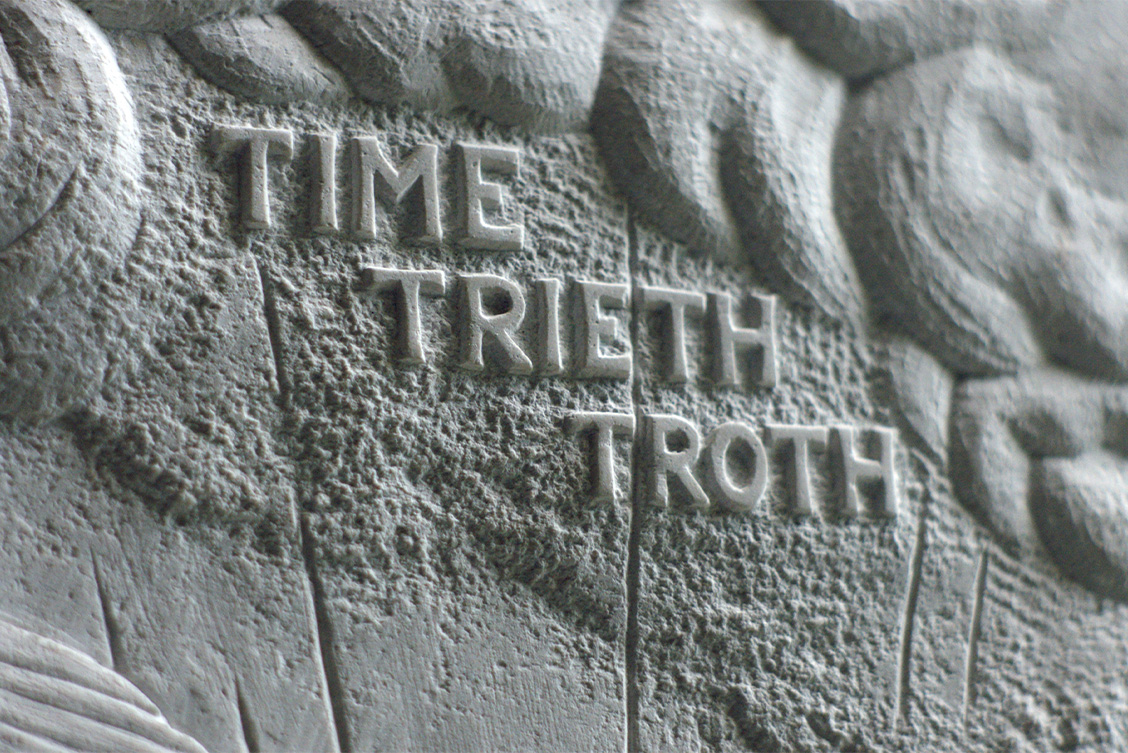 Grace Weir: The history of light | Saturday 30 September – Friday 17 November 2023 | Solstice Arts Centre | Image: photograph of the words TIME TRIETH TROTH which look as though carved in stone; the letters are on a rough background, with what may be clouds swirling above and something akin to rays of the sun coming from below 