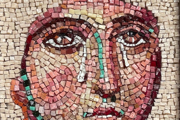 Ursula Burke, Weeping Portrait, 2022 (Detail), © The Artist | Ursula Burke: Siren | Saturday 22 February – Sunday 27 April 2025 | Butler Gallery | Image: Ursula Burke, Weeping Portrait, 2022 (Detail), © The Artist | we see part of a face made using mosaic in Greco-Roman style; just mouth, nose, eyes and one ear; the eyes are brown and slightly raised to heave; this person does not seem too happy 