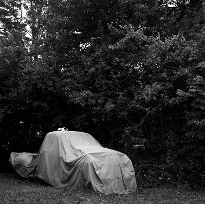 Dana Gentile: Tucked Away, 2009, silver gelatin print, 25 x 25cm | Six Memos presents Trompe Le Monde at Occupy Space | Friday 4 February  – Friday 4 March 2011 | Occupy Space