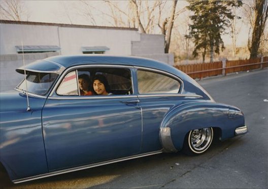 Meridel Rubenstein: Donaldo Valdez, El guique, ’49 Chevy,  from “The Lowriders, Portraits from New Mexico,” 1980, Colour coupler print, 35.6 x 43.2 cm, @ Meridel Rubenstein | Conversations: Photography from the Bank of America Collection | Wednesday 22 February  – Sunday 20 May 2012 | IMMA