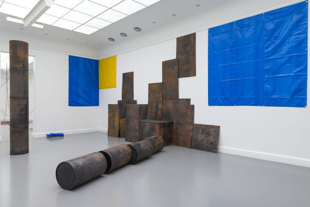 Sheela Gowda: Kagebangara, 2008, flattened tar drum sheets, tar drums, mica tar sheet, mica, tarpaulin, dimensions variable, Installation view at Van Abbemuseum, 2013, Image Courtesy: The Artist and GALLERYSKE, © Peter Cox

 | Sheela Gowda: Open Eye Policy | Saturday 5 April  – Sunday 22 June 2014 | IMMA