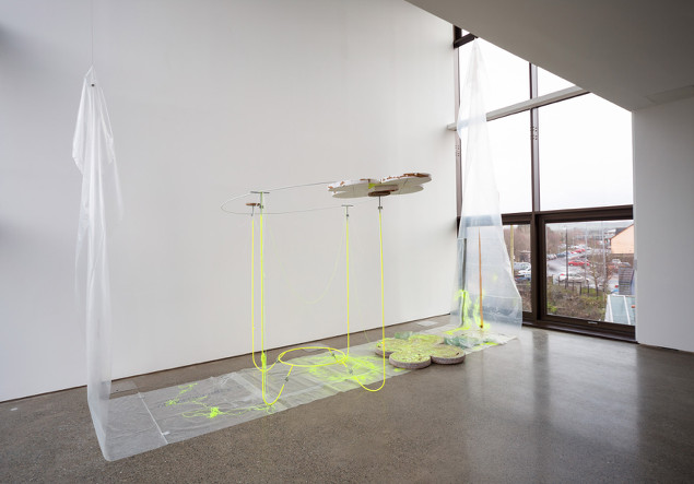 Maud Cotter: 'The relational space is the thing that's alive with something from somewhere else', 2014 – 2015, 5m x 6m x 220cms,  plastic, cardboard, string, cable ties, aeroboard, steel, paint, rubber, plaster, tape; photograph Roland Paschhoff © 2015  | Fourth Space | Saturday 31 January  – Saturday 14 March 2015 | Uillinn: West Cork Arts Centre