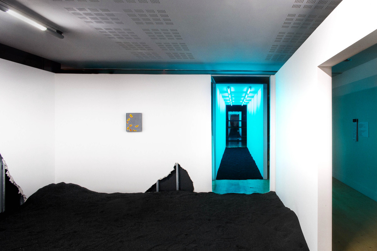 Tamsin Snow & Sarah Tynan: MULTIFAITH, 2015, RA, London; béton ciré, fabric concertina partition, wood, glass, neon, plywood, prayer mats; 600 x 400 x 300 cm | Tamsin Snow & Sarah Tynan: Resort | Friday 10 March  – Saturday 22 April 2017 | Mermaid Arts Centre