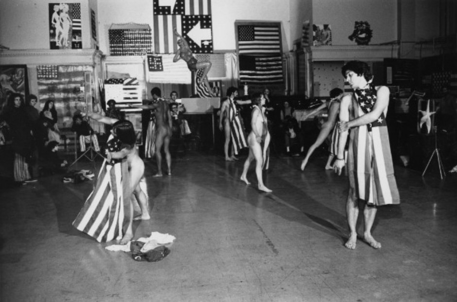 Peter Moore, Performance view of Yvonne Rainer’s “Trio A with Flag,” Judson Memorial Church, 1970. © Barbara Moore/Licensed by VAGA, New York, NY. Courtesy Paula Cooper Gallery, New York. | Yvonne Rainer: Selected Works – Live performance, talks & film screenings | Saturday 12 May  – Sunday 13 May 2018 | IMMA