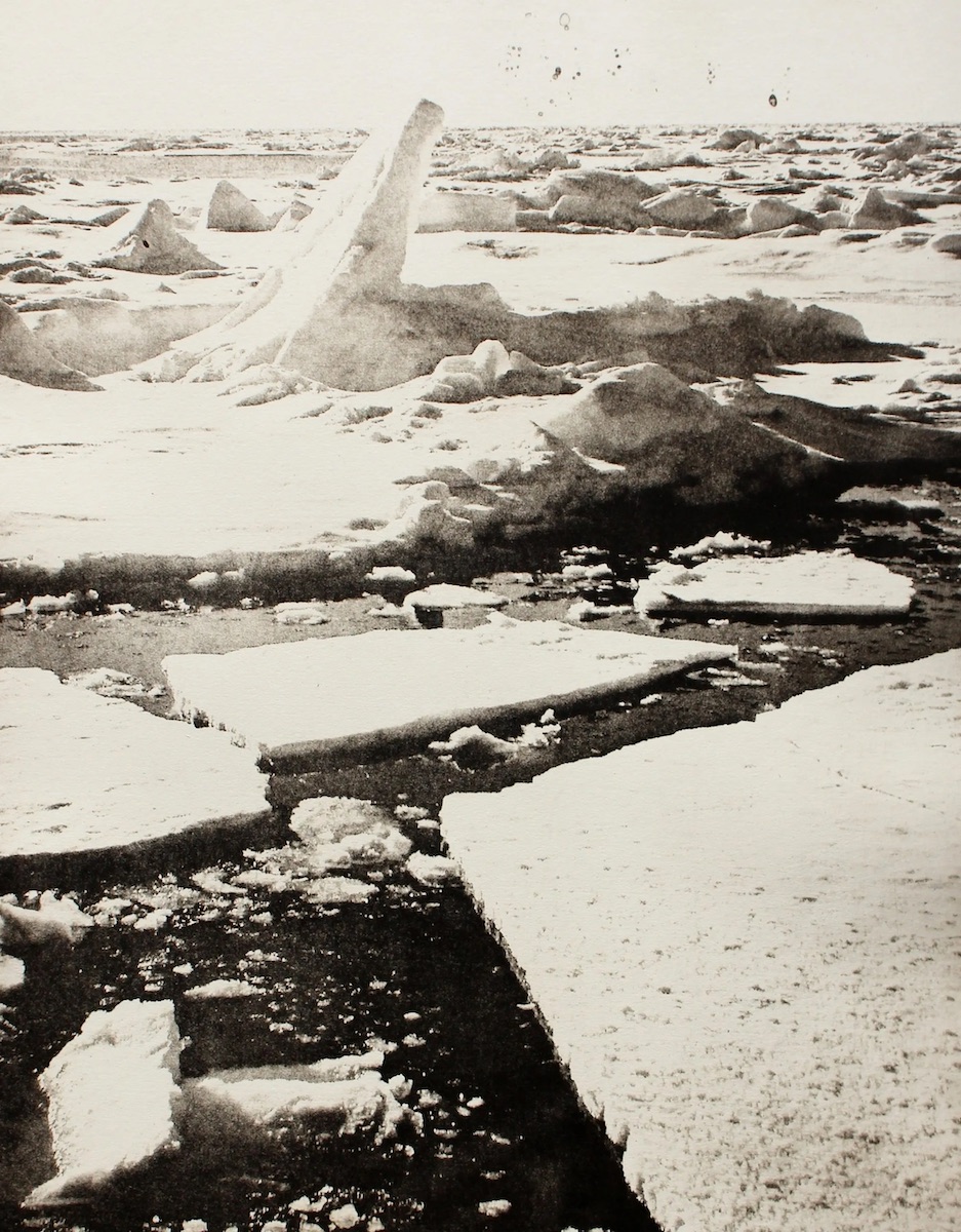 Angela Gilmour: The Last of Ice, etching, 2020; courtesy the artist | Angela Gilmour: Without Borders | Saturday 2 September  – Sunday 8 October 2023 | GOMA Gallery of Modern Art | Image: Angela Gilmour: The Last of Ice, Etching, 2020 – photo-based black-and-white etching on cream-coloured paper; we see chunks and hummocks of broken sea ice, stretching from near the viewer as far as the horizon; one chunk has been pressured off the horizontal, so that it sticks up at a steep slant; it‘s sunny, so shadows are cast; a pattern of dapples in the sky suggest that this photo may be old have been taken with a film camera  