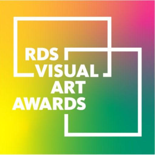 RDS Visual Art Awards 2023 | Friday 8 December 2023  – Sunday 3 March 2024 | IMMA | Image: multi-hued background, shading from predominantly orange and yellow on the left to pink-ish red top right and strong green bottom right; the thick, white outlines of two rectangles overlay the background, intersecting with each other; in white and upper-caase, the words ‘RDS VISUAL ARTS AWARDS‘ interrupt the rectangles 