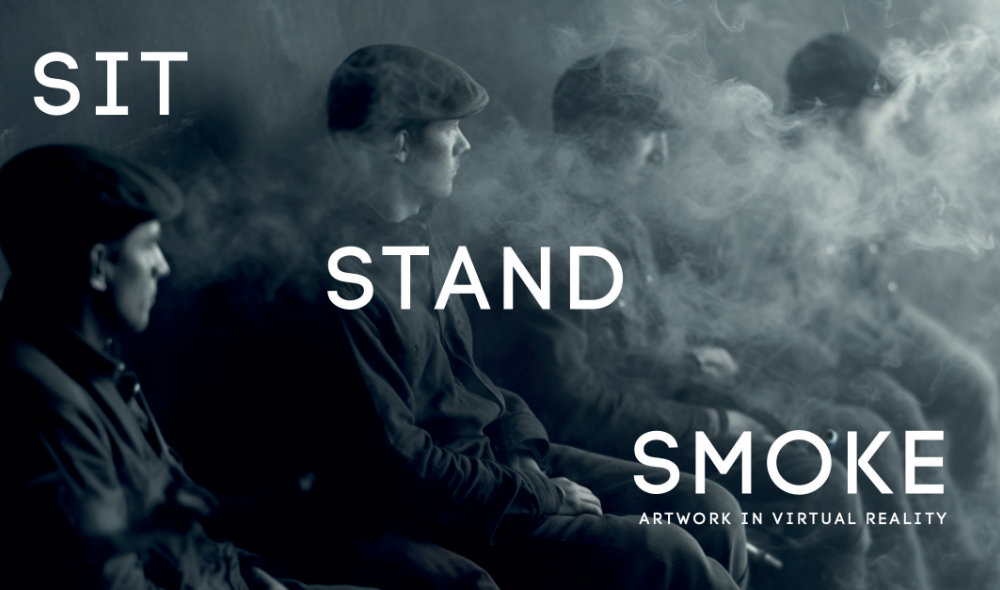 Curtin and Keating: Sit Stand Smoke (Hero), 2023 © the artists | CURTIN // KEATING: Sit Stand Smoke | Friday 26 April  – Sunday 5 May 2024 | Crawford Art Gallery | Image: Curtin and Keating: Sit Stand Smoke (Hero), 2023 © the artists | black-and-white, landscape-format photo or video still; four figures in a smoke-filled environment; they are sitting, probably on a bench, arranged from left to right and all apparently looking towards their left; each is short-haired and wearing a flat cap 