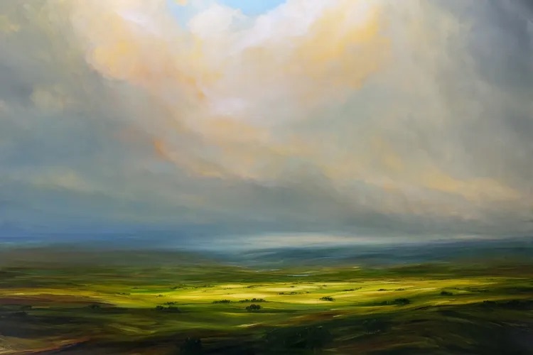 Harry Brioche: Radiant Rays, Oil on Board, 101.6 x 152.4cm | Harry Brioche: Emerald Dreams | Saturday 6 July  – Wednesday 24 July 2024 | Gormleys Fine Art, Dublin | Image: Harry Brioche: Radiant Rays, Oil on Board, 101.6 x 152.4cm | view out over an undulating plain; the land is mostly various shades of freen, with some hint of boggier (brown) land; most of the land is under the shadow of clouds, but a central area is more brightly illuminated; high clouds tinged with orange rise above the land 