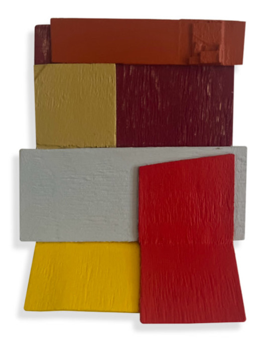 James O’Connor: Variation No. 2, 2023, acrylic/wood, 13.5 x 10.5 cm | James O’Connor: Transit | Friday 20 September  – Saturday 12 October 2024 | Taylor Galleries | Image: James O’Connor: Variation No. 2, 2023, acrylic/wood, 13.5 x 10.5 cm | for the most part the pieces of wood are rectangular in shape, though one is square (greenish beige), and one is more of a trapezoid (a strong red); most of the pieces just abut each other to form a portrait-orientation work taht is very roughly itself a triangle; the one piece that does not abut is the red on – it fills the space bottom right but overlaps a large grey horizontal rectangle 