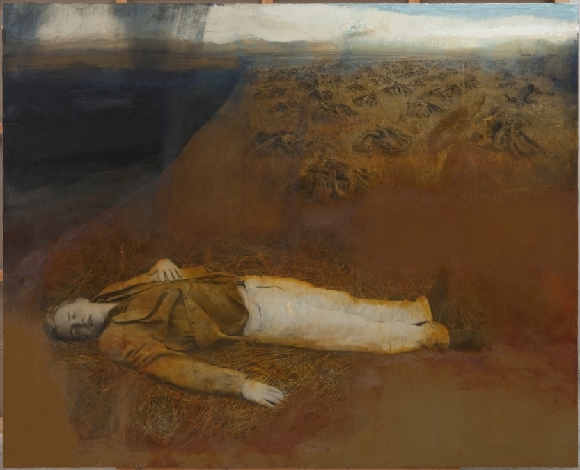 Hughie O’Donoghue, The Leave Taking, 2009, Oil, mixed media on canvas, 274 x 335cm, Image courtesy of the artist. | BogSkin | Thursday 30 January –    Sunday 20 April 2025 | Royal Hibernian Academy | Image: Hughie O’Donoghue, The Leave Taking, 2009, Oil, mixed media on canvas, 274 x 335cm, Image courtesy of the artist. |  
 large-scale tinted photographic work (?); in the foreground we see a figure lying in a field, possibly dead; the view of the figure is side-on, with the head to the left and feet towards to the right; the left hand is over the heart, the right stretched out beside the figure; the head is turned towards us, eyes closed; the figure is wear what seems to be a complex jacket, plus white troushers and dark shoes; beyond, a field of small hay-ricks stretches into the distance