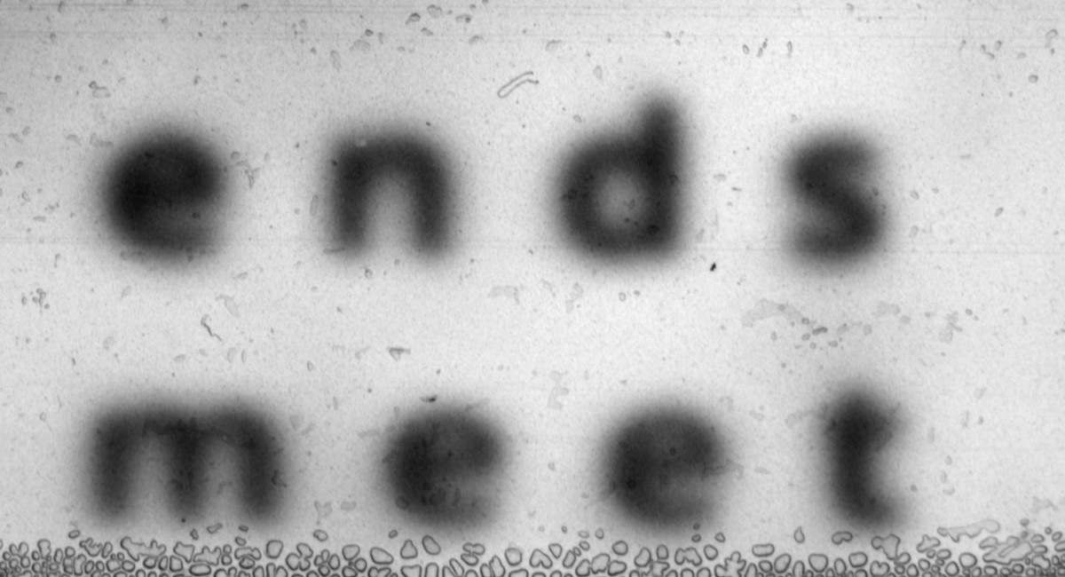 Helena Gouveia Monteiro: ends meet | Saturday 15 March  – Saturday 26 April 2025 | SIRIUS | Image: apparently a grainy photo, in black-and-white and taken with an analogue camera; the image is solely of the words ‘ends meet’ in lower case and black against a white background 