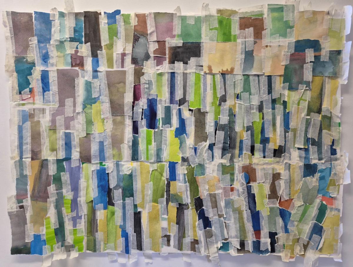 Sarah Walker: Valpariso, Wear and Tear | Uillinn: West Cork Arts Centre’s Members and Friends Exhibition 2025 | Saturday 31 May  – Thursday 3 July 2025 | Uillinn: West Cork Arts Centre | Image: Sarah Walker: Valpariso, Wear and Tear | photo of an artwork that seems to consist of pieces of paper torn from a notebook, each piece a more or less uniform colour and in hues that suggest watercolour; the pieces are held together with masking tape, maybe four or five rows of these pieces of paper, with maybe 20 pieces per row, each piece taller than it is wide; there is a LOT of masking tape; there is also a sort of convergence going on bottom right 