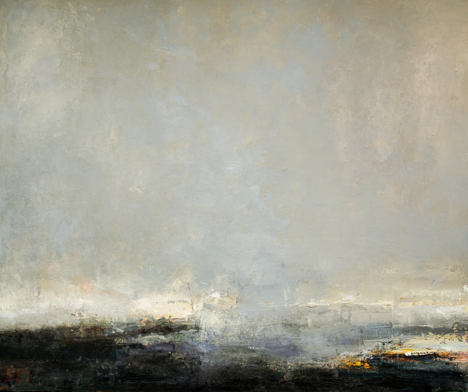 Carol Hodder: Between the Tides, oil on canvas, 153 x 181cm | Carol Hodder: At the End of the Day | Thursday 28 August  – Saturday 20 September 2025 | Solomon Fine Art | Image: Carol Hodder: Between the Tides, oil on canvas, 153 x 181cm | quite dramatic seascape; black waves topped by white white horse, churning, mist; this fills the bottom quarter of the artwork; above that is a sky that suggest drama and warmth – greys and subtle ochres and barely a hint of blue 
