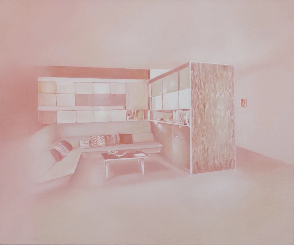 Niamh Porter: Case study No. 8, 2022, oil on canvas, 50 x 60cm | Niamh Porter: The Shape of Longing | Friday 3 April  – Saturday 6 June 2026 | Taylor Galleries | Niamh Porter: Case study No. 8, 2022, oil on canvas, 50 x 60cm | view of what may be a resting area within an office environment, painted in shades of pink with hints of yellow; we see a long sofa, L-shaped, with a coffee table in front of it, possibly with a flower on it and some documents, etc.; there are cushions on the sofa; And there are a lot of cupboards and a surface on which you might make yourself a tea / coffee, maybe 
